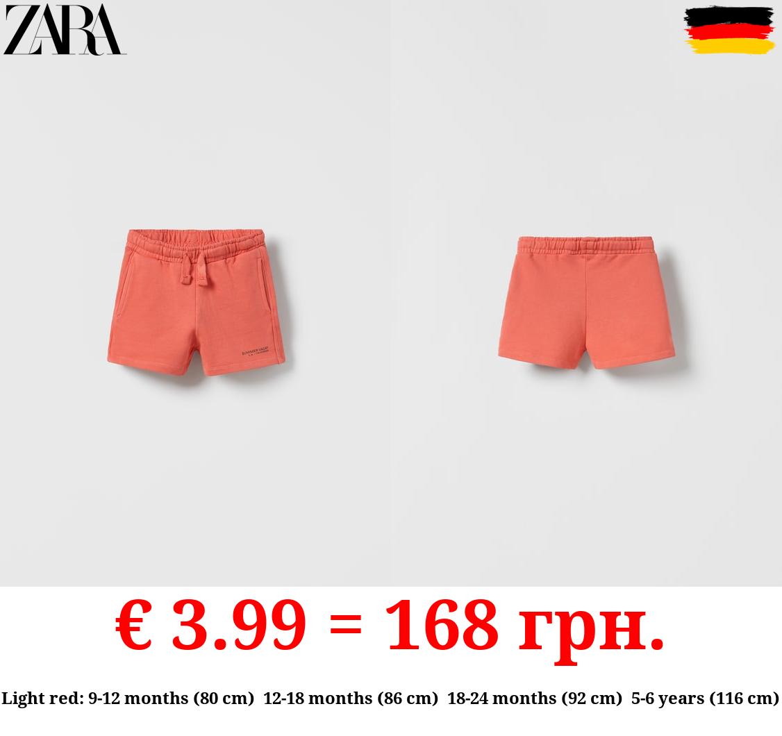 PLUSH JERSEY BERMUDAS WITH SLOGAN