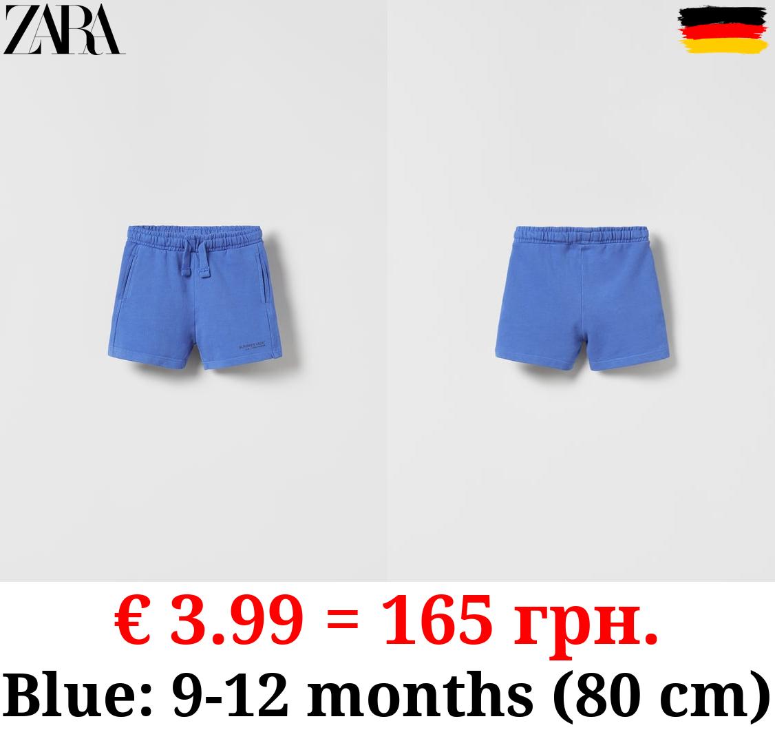 PLUSH JERSEY BERMUDAS WITH SLOGAN
