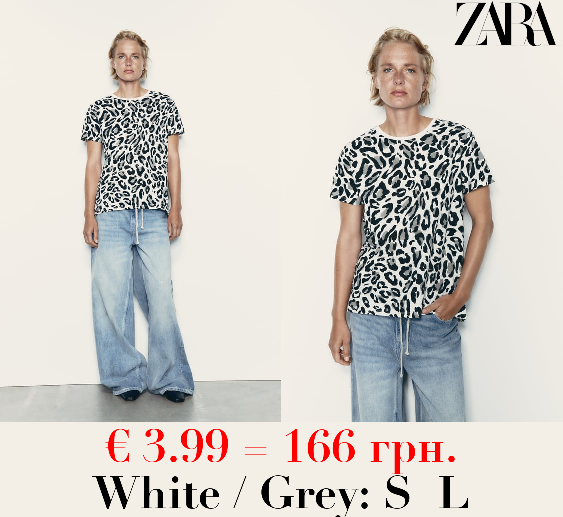 BASIC T-SHIRT WITH ASYMMETRIC HEM