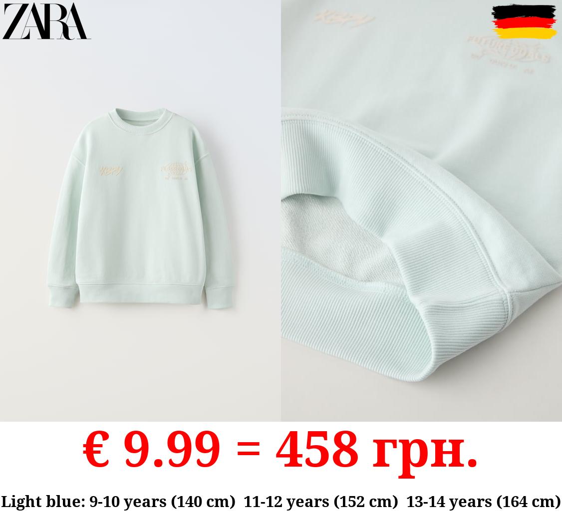 SWEATSHIRT WITH RAISED SLOGAN