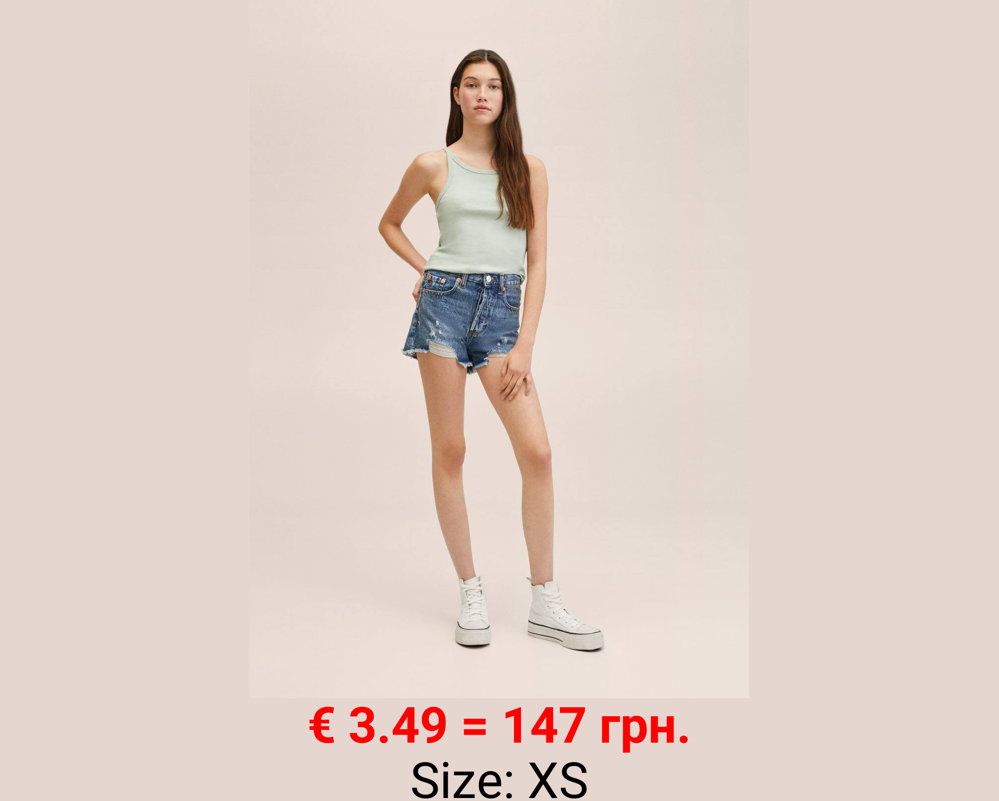 Short denim rotos decorativos