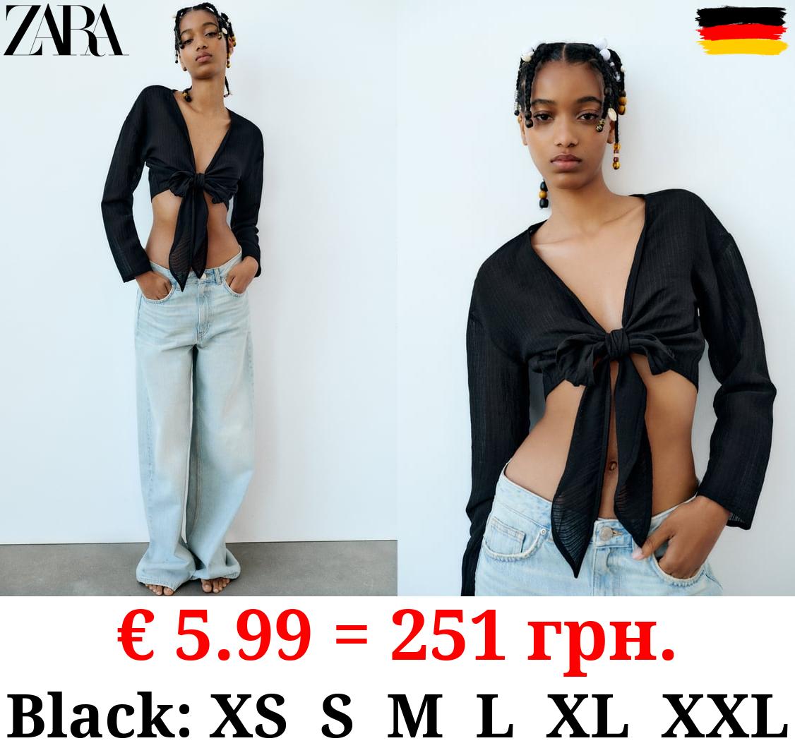 TEXTURED TOP WITH KNOT