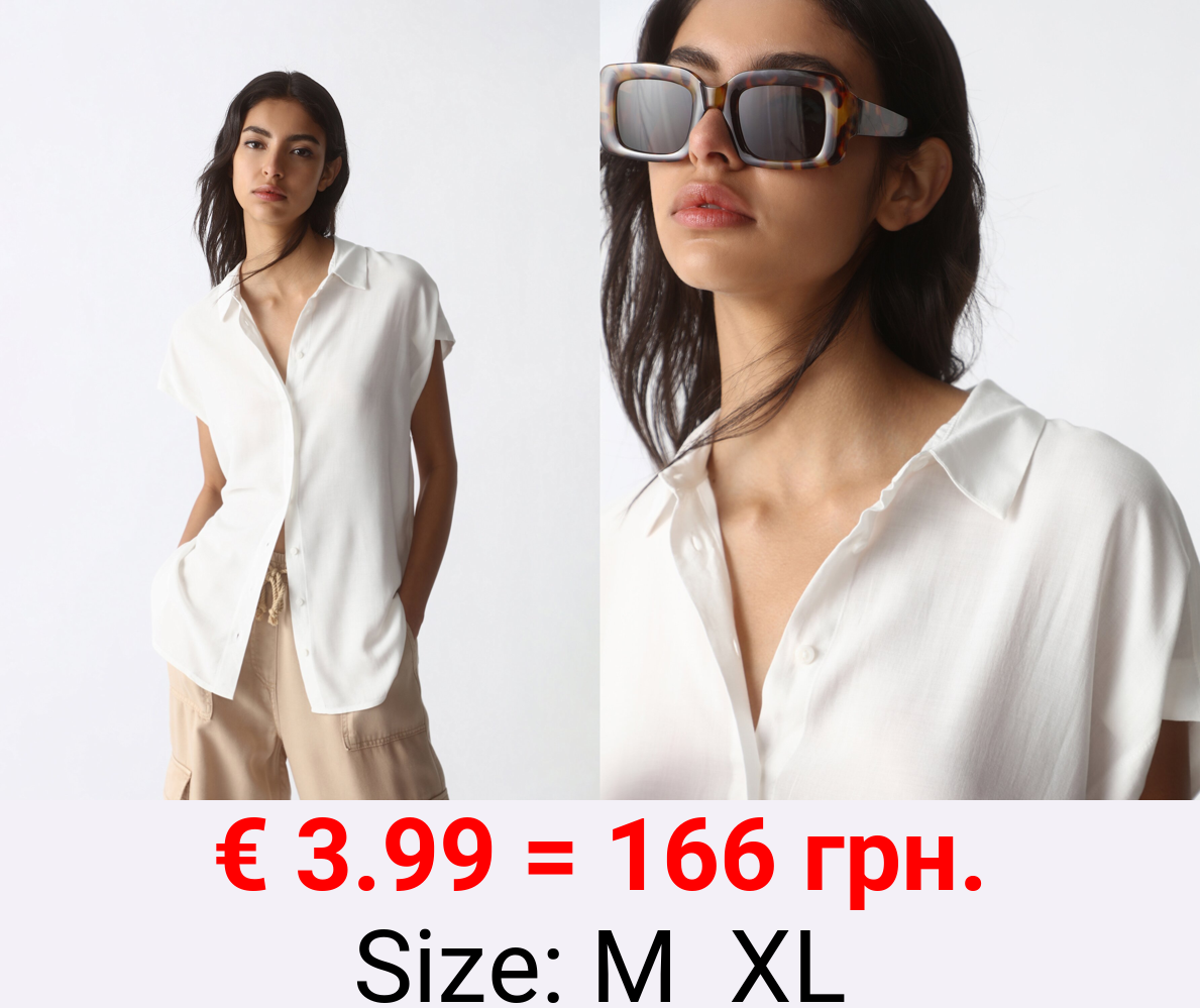 Flowing sleeveless shirt