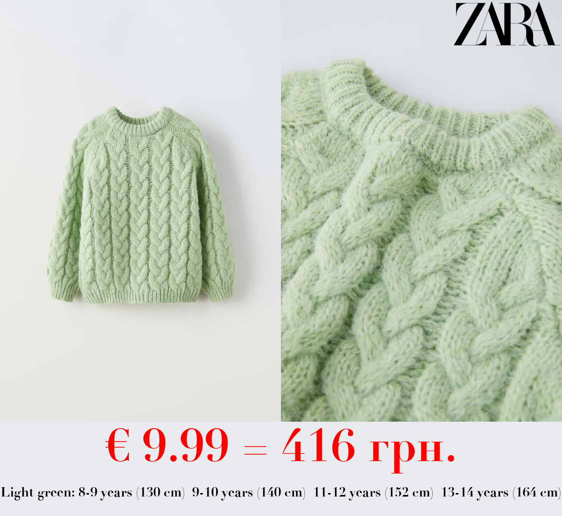 CABLE-KNIT SWEATER