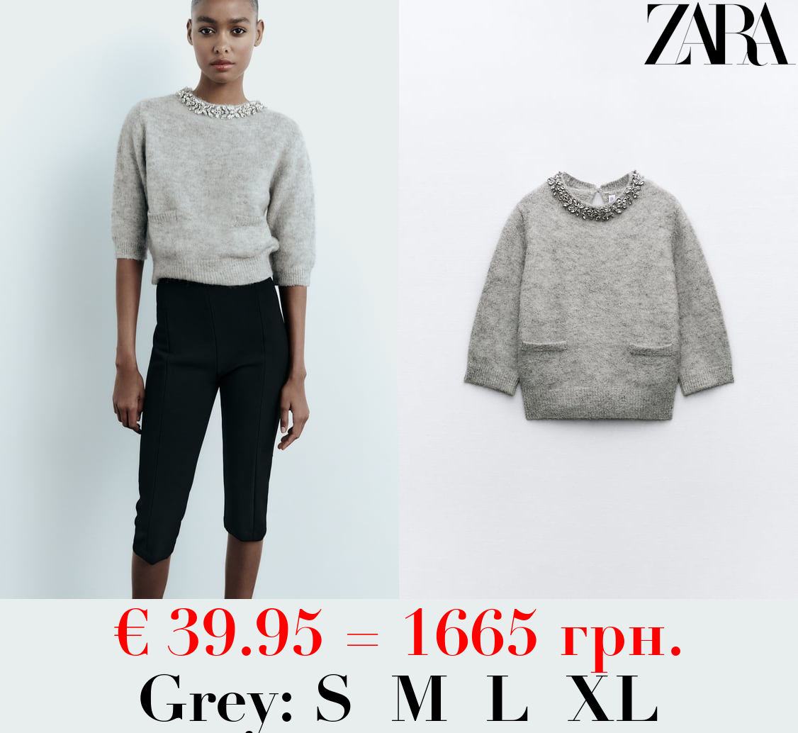 KNIT SWEATER WITH RHINESTONE NECK