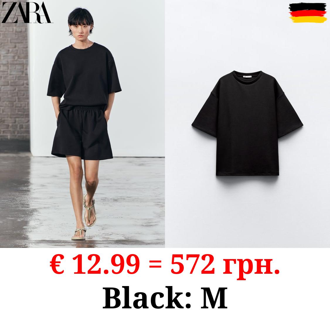 SHORT SLEEVE INTERLOCK SWEATSHIRT