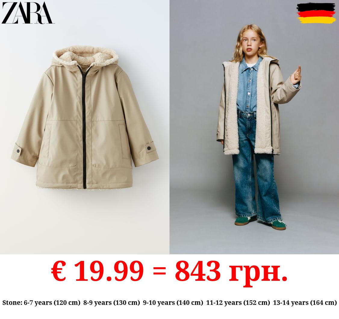 RUBBERISED RAINCOAT WITH FAUX SHEARLING