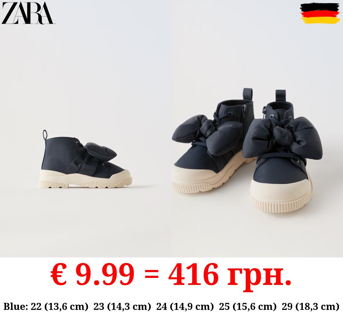 HIGH TOP SNEAKERS WITH BOW