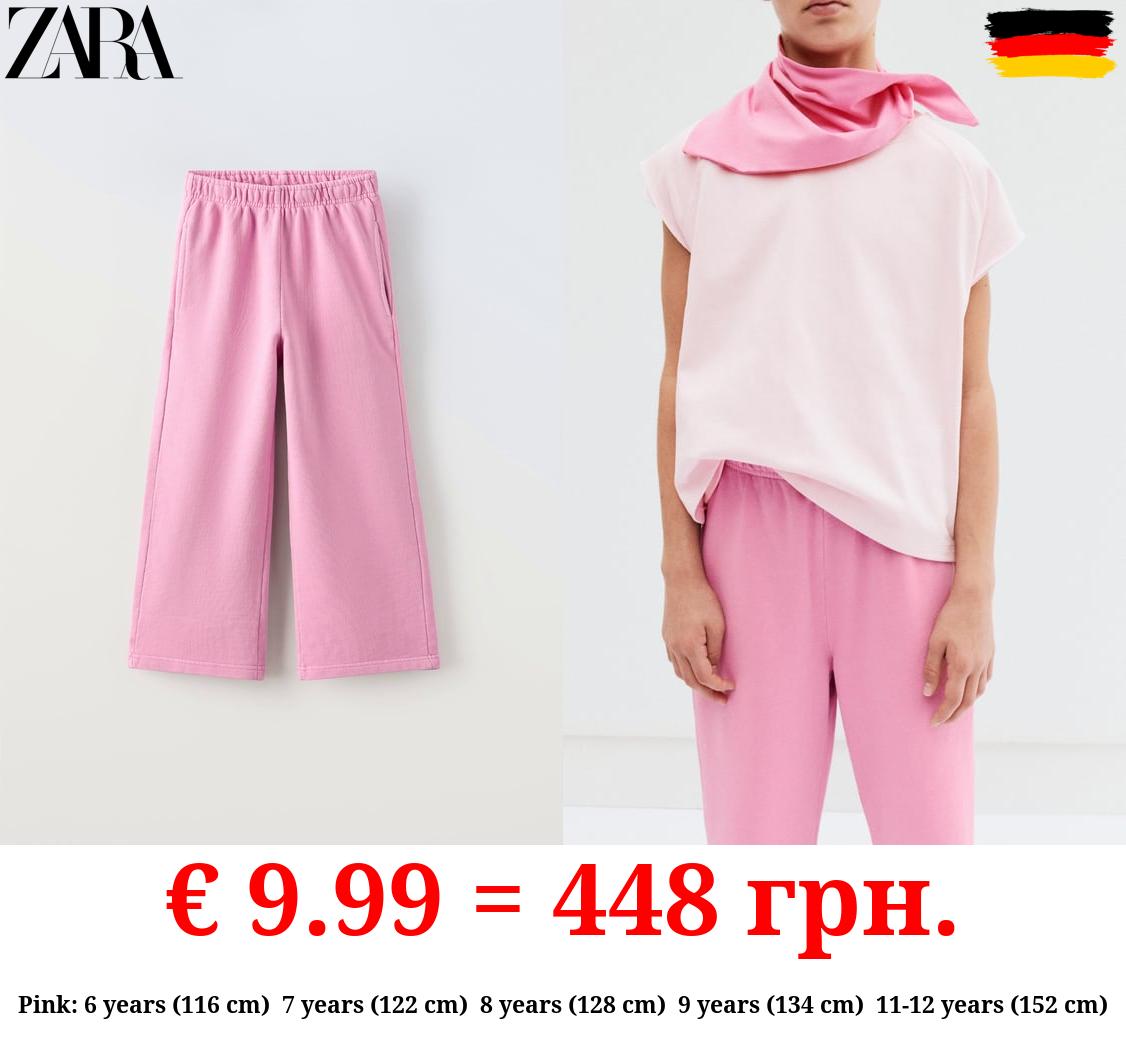 WIDE-LEG FADED-EFFECT JOGGING TROUSERS