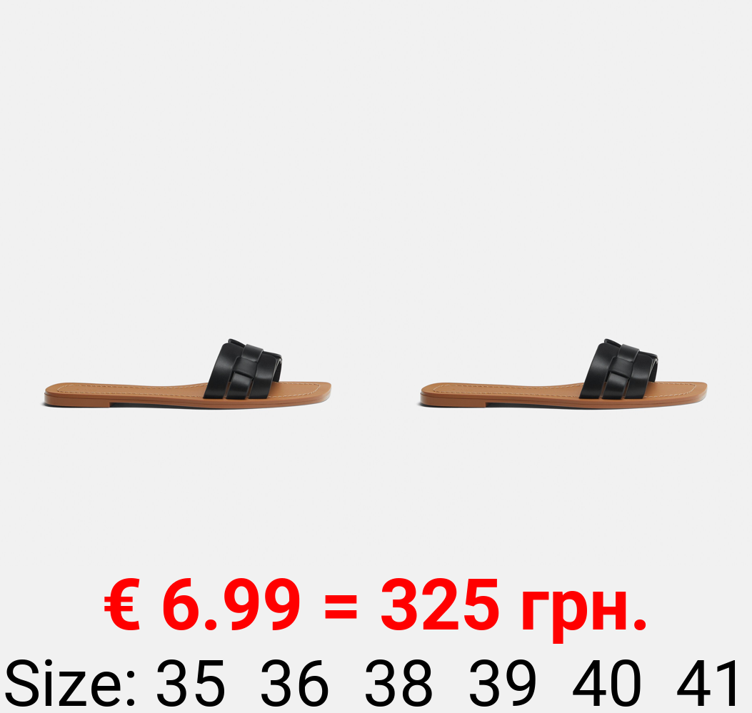 Flat sandals with interwoven detail