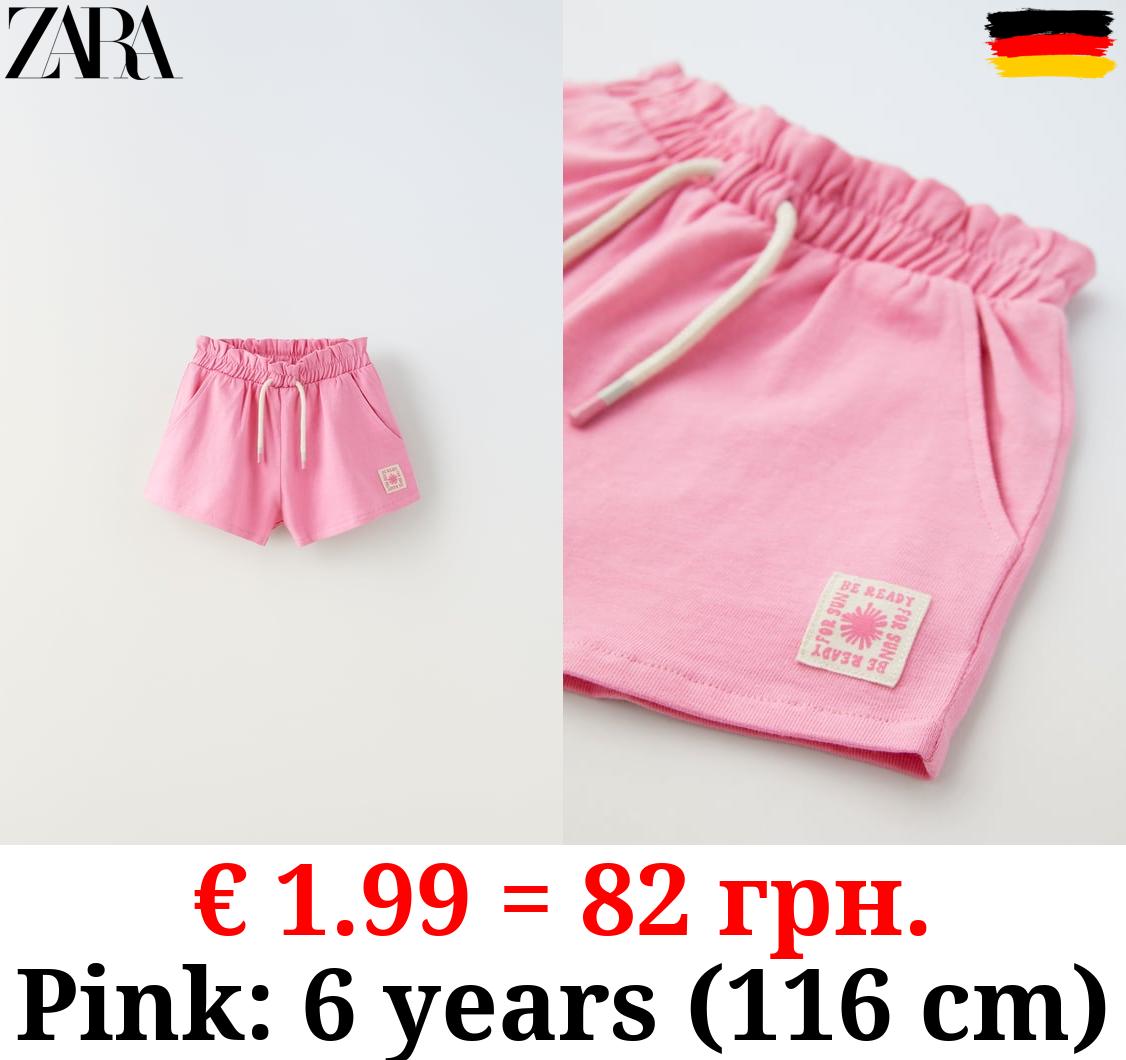 PLUSH BERMUDA SHORTS WITH LABEL DETAIL