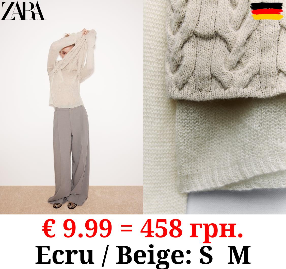 KNIT SWEATER WITH CONTRAST VEST