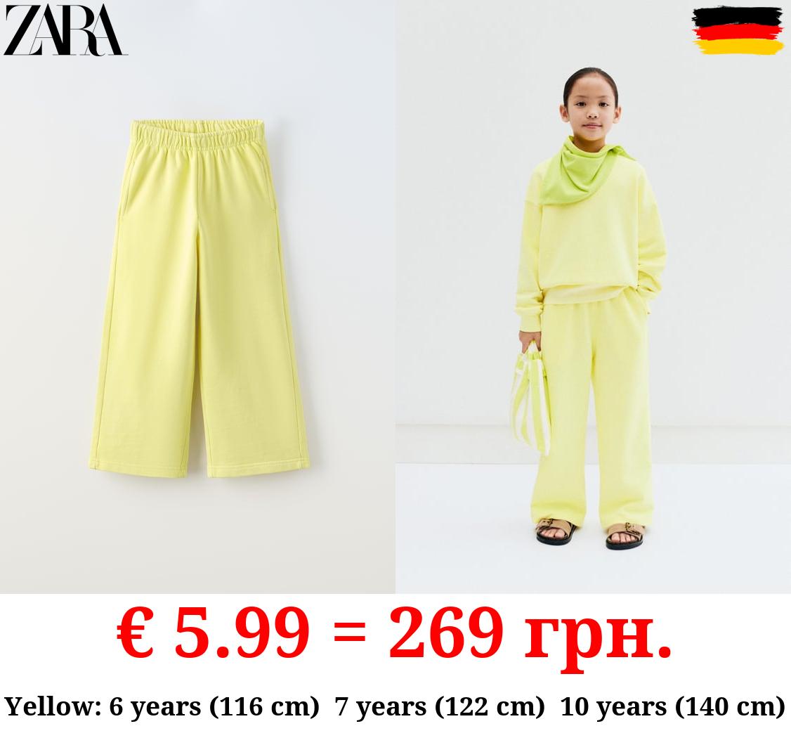 WIDE-LEG FADED-EFFECT JOGGING TROUSERS