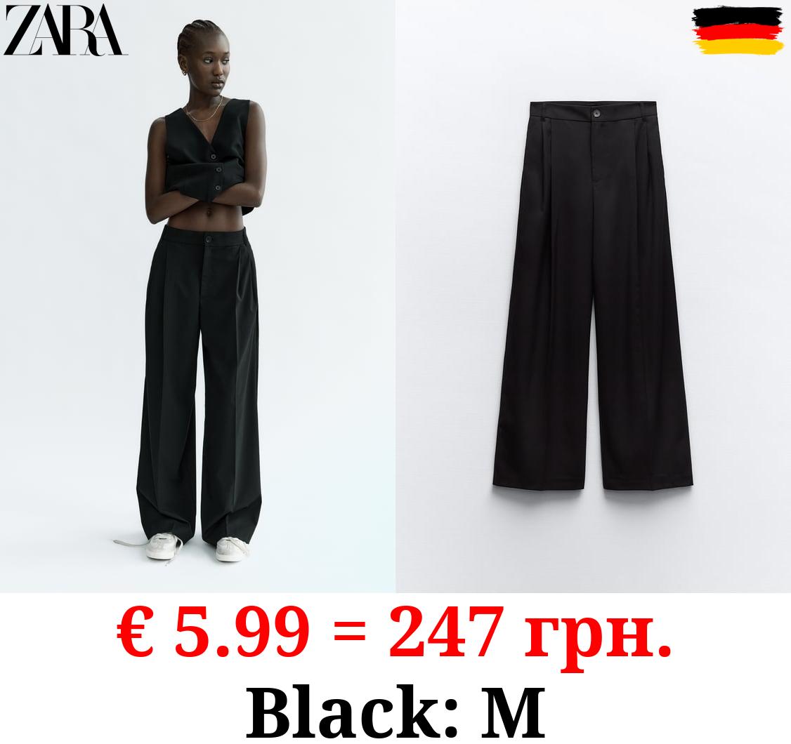 FULL-LENGTH PLEATED TROUSERS
