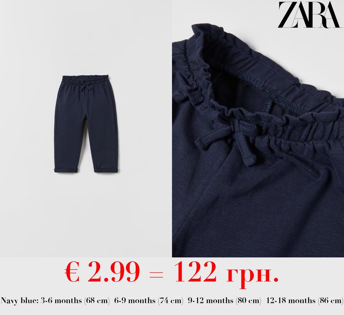 BOHO-STYLE TROUSERS WITH BOW