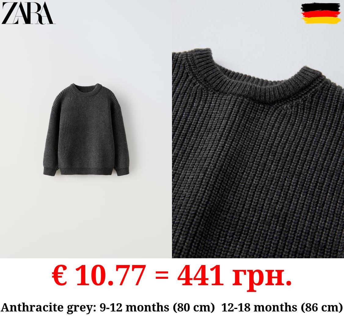 HALF-CARDIGAN KNIT SWEATER