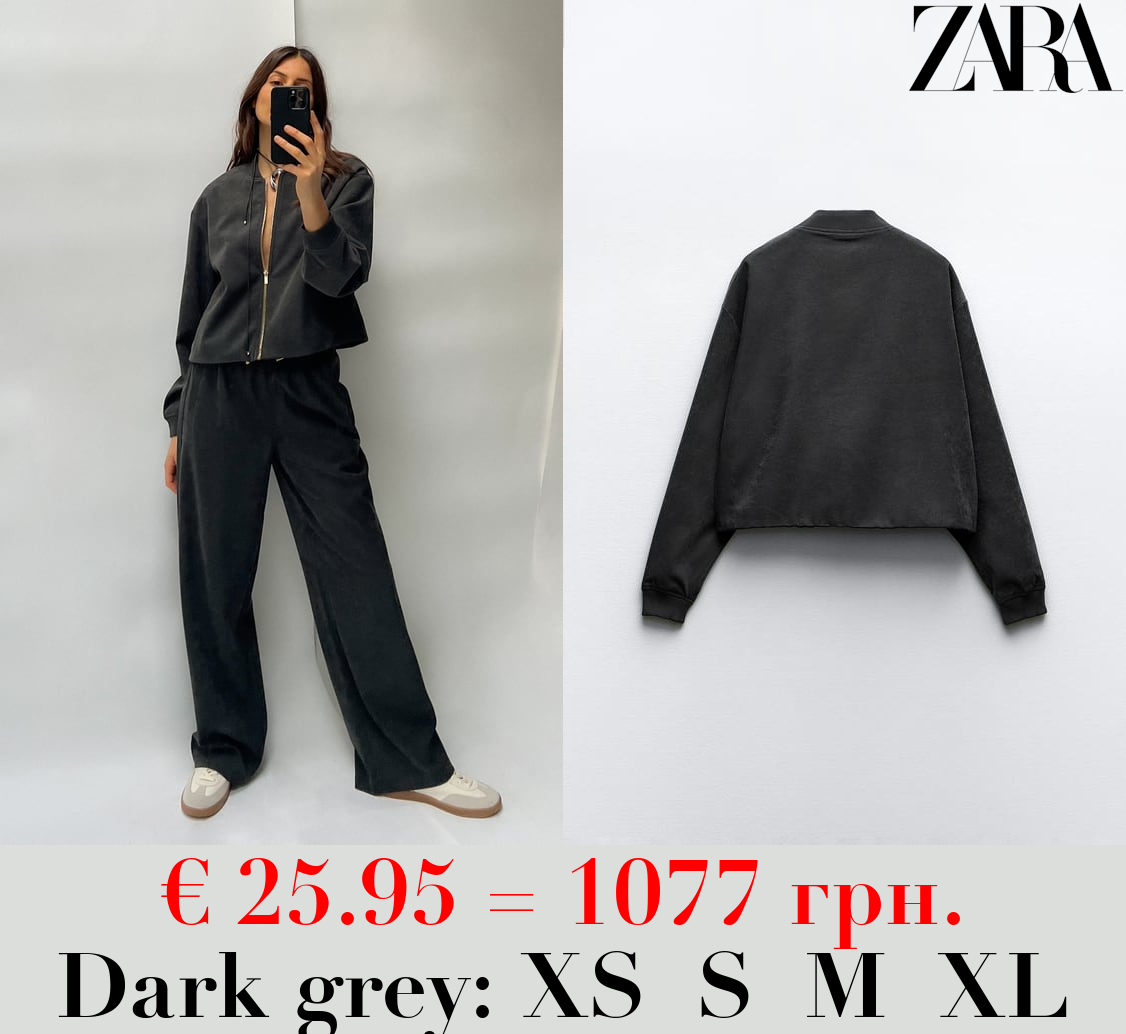 BOMBER JACKET WITH ADJUSTABLE HEM