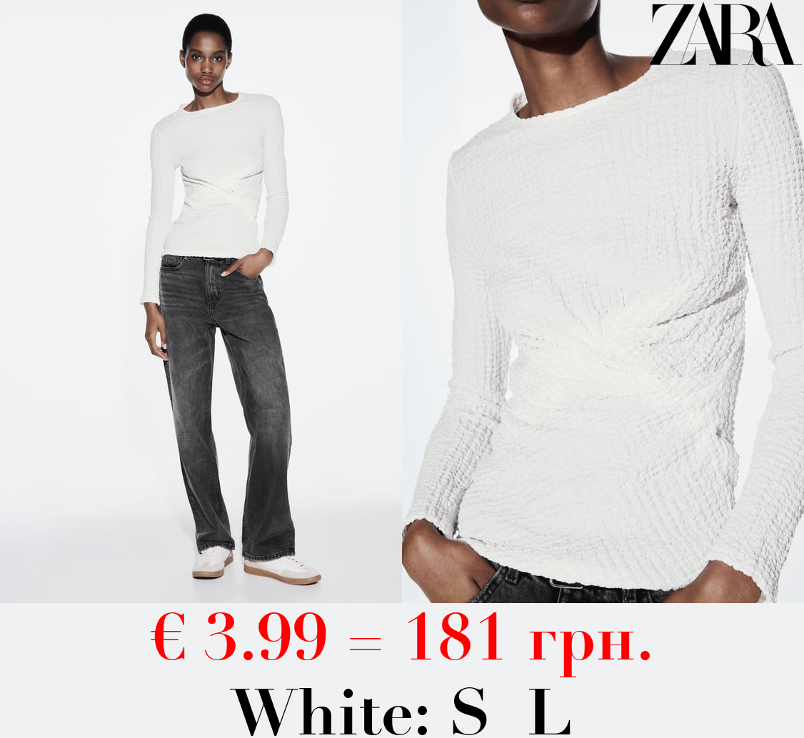 TEXTURED TOP WITH GATHERED DETAIL