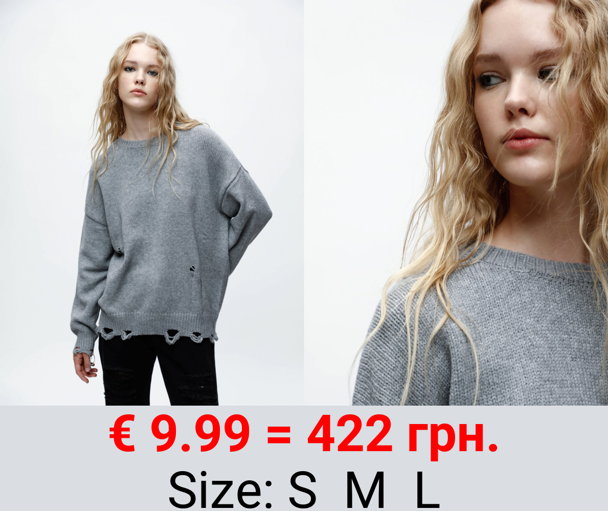 Oversized ripped sweater