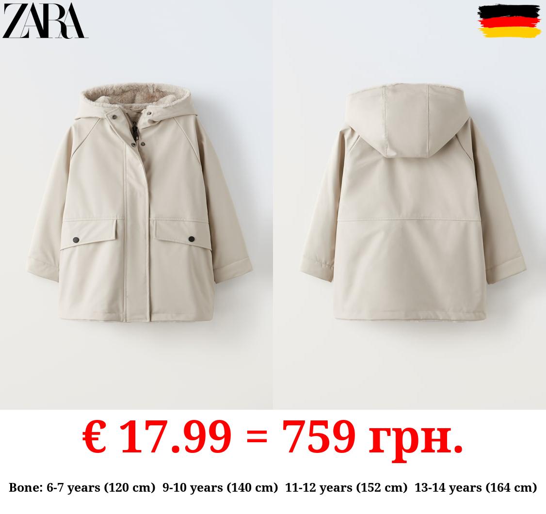 RUBBERISED RAINCOAT WITH FAUX FUR