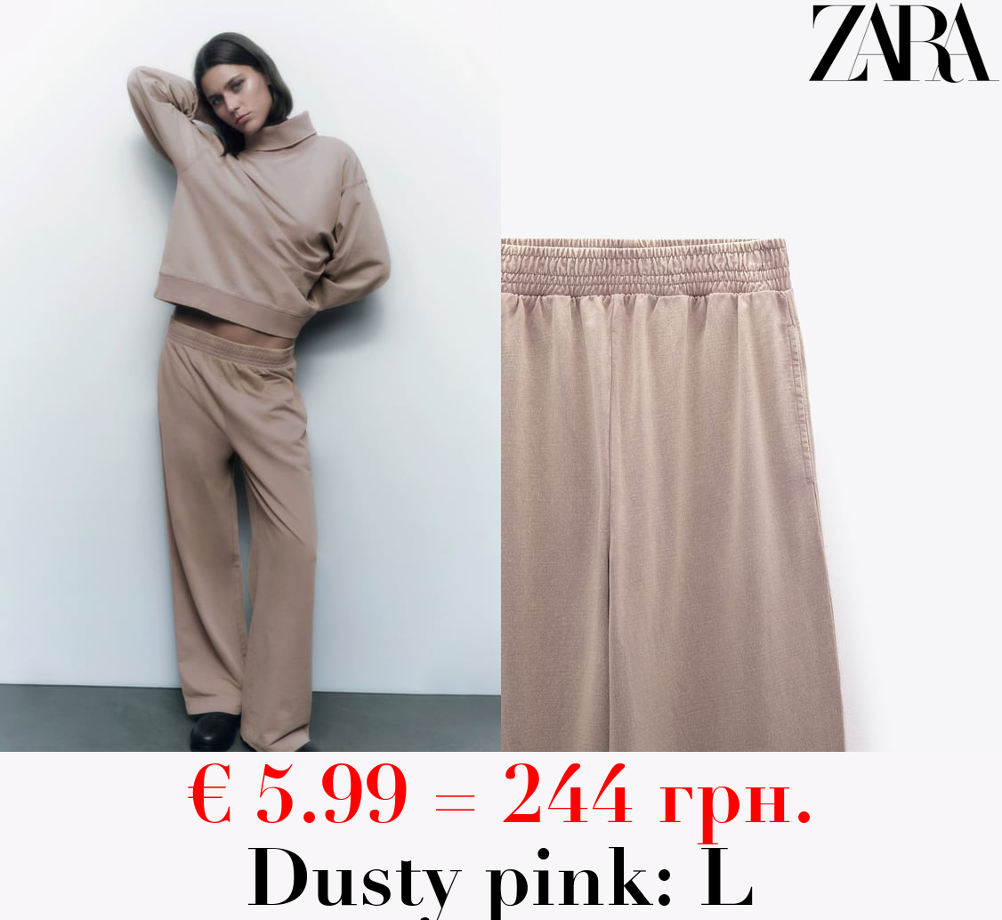 WASHED EFFECT TROUSERS