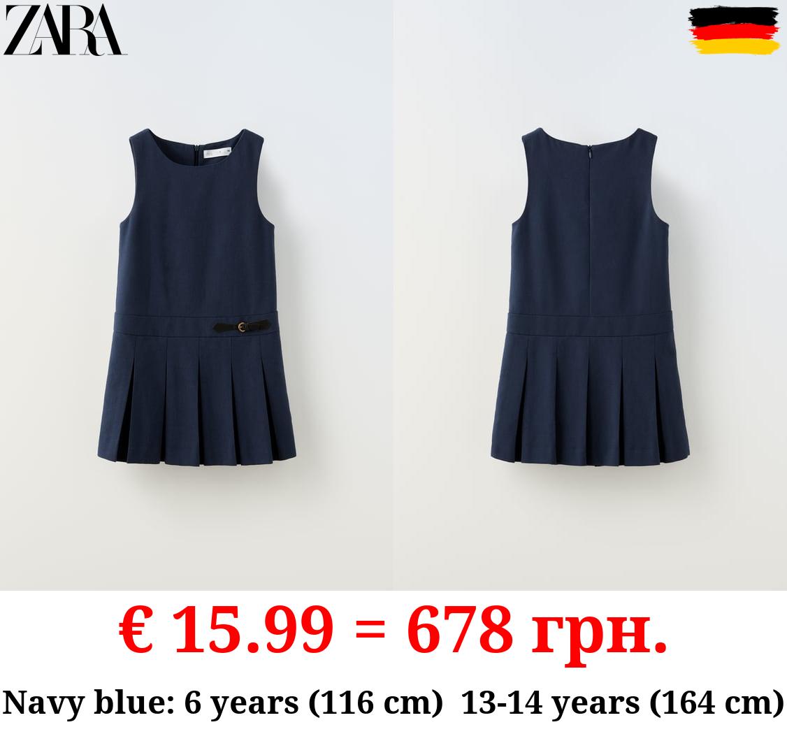 BOX PLEAT PINAFORE DRESS WITH BUCKLE