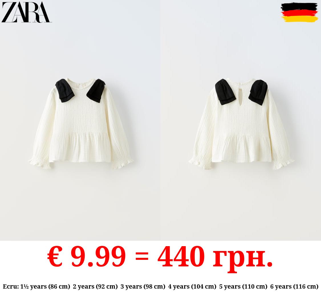 DOTTED MESH BLOUSE WITH BOWS