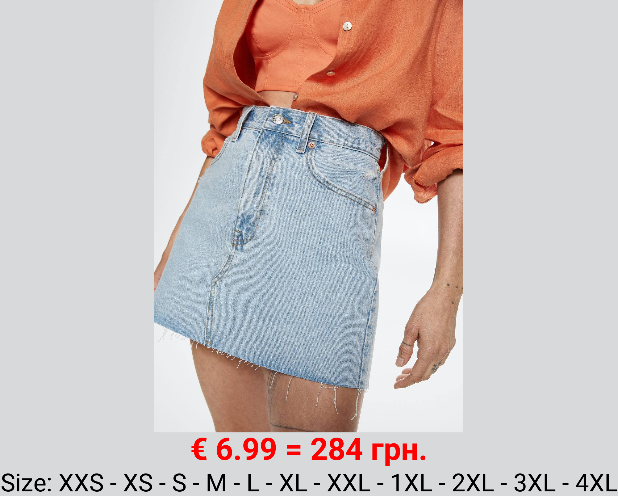 Minifalda vaquera bajo deshilachado