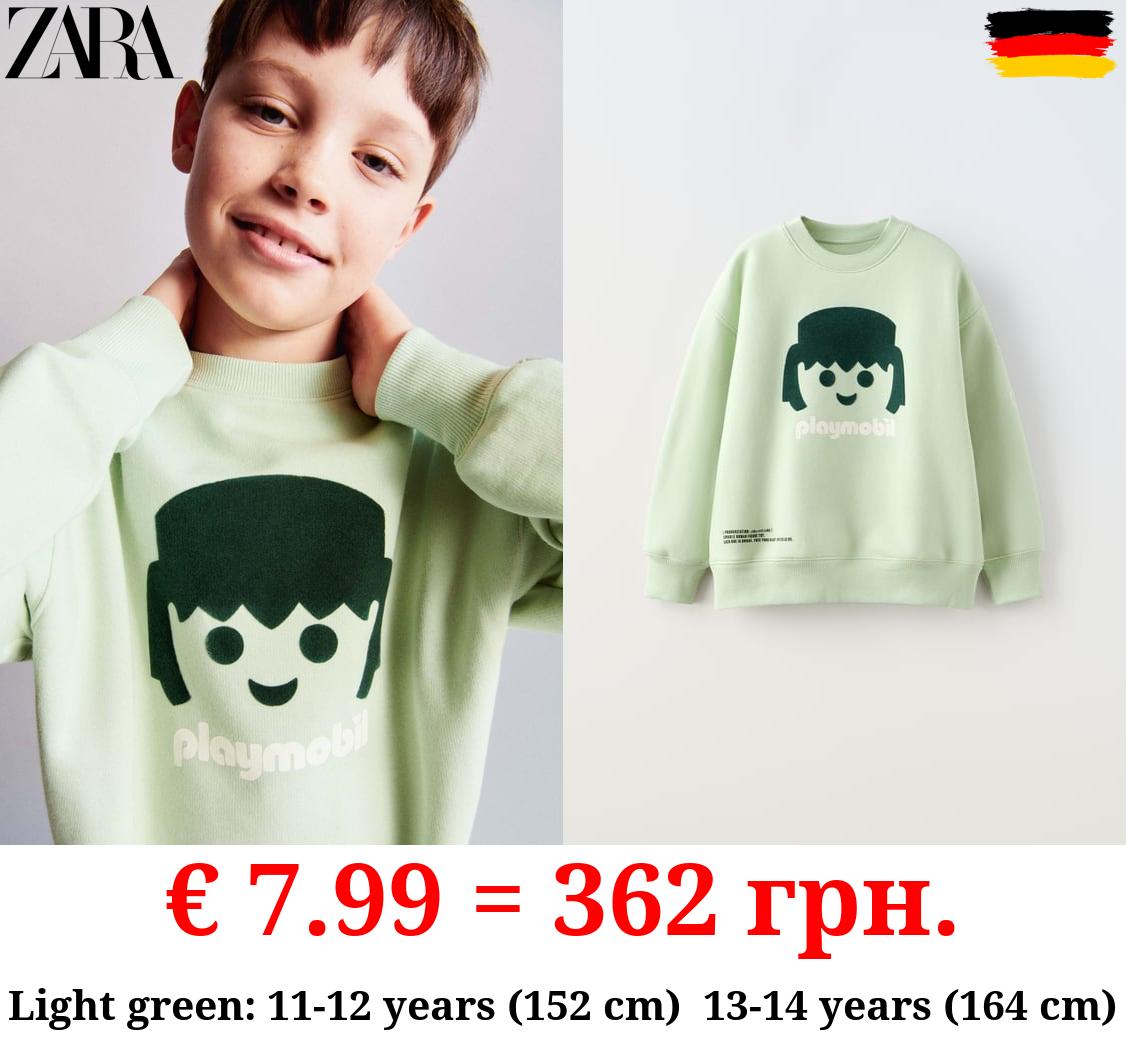 FLOCKED PLAYMOBIL © PRINT SWEATSHIRT