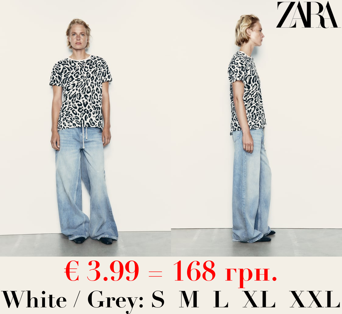 BASIC T-SHIRT WITH ASYMMETRIC HEM