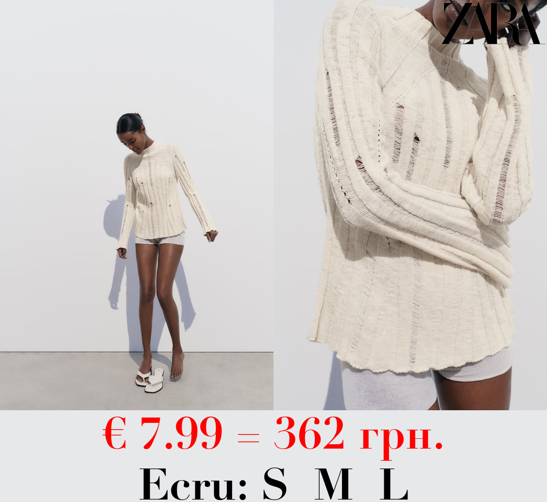 RIBBED KNIT SWEATER WITH RIPS