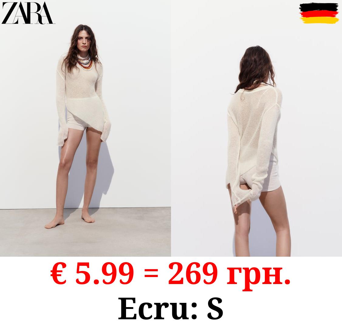 ASYMMETRIC KNIT SWEATER