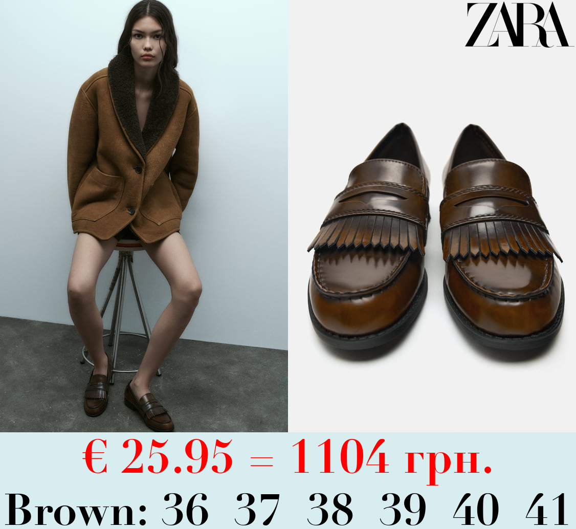 DISTRESSED FLAT LOAFERS