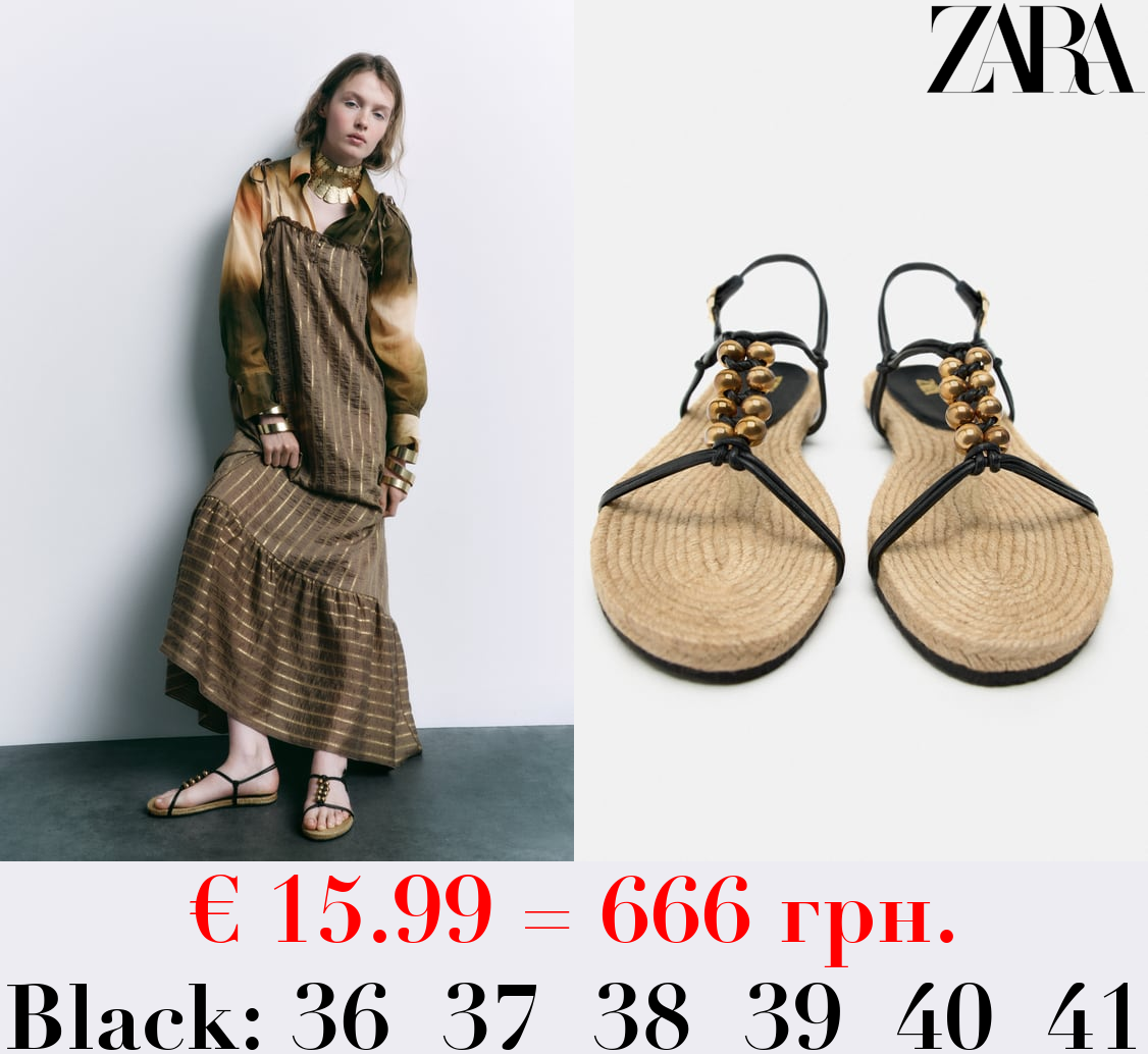 FLAT SANDALS WITH BALL DETAILS