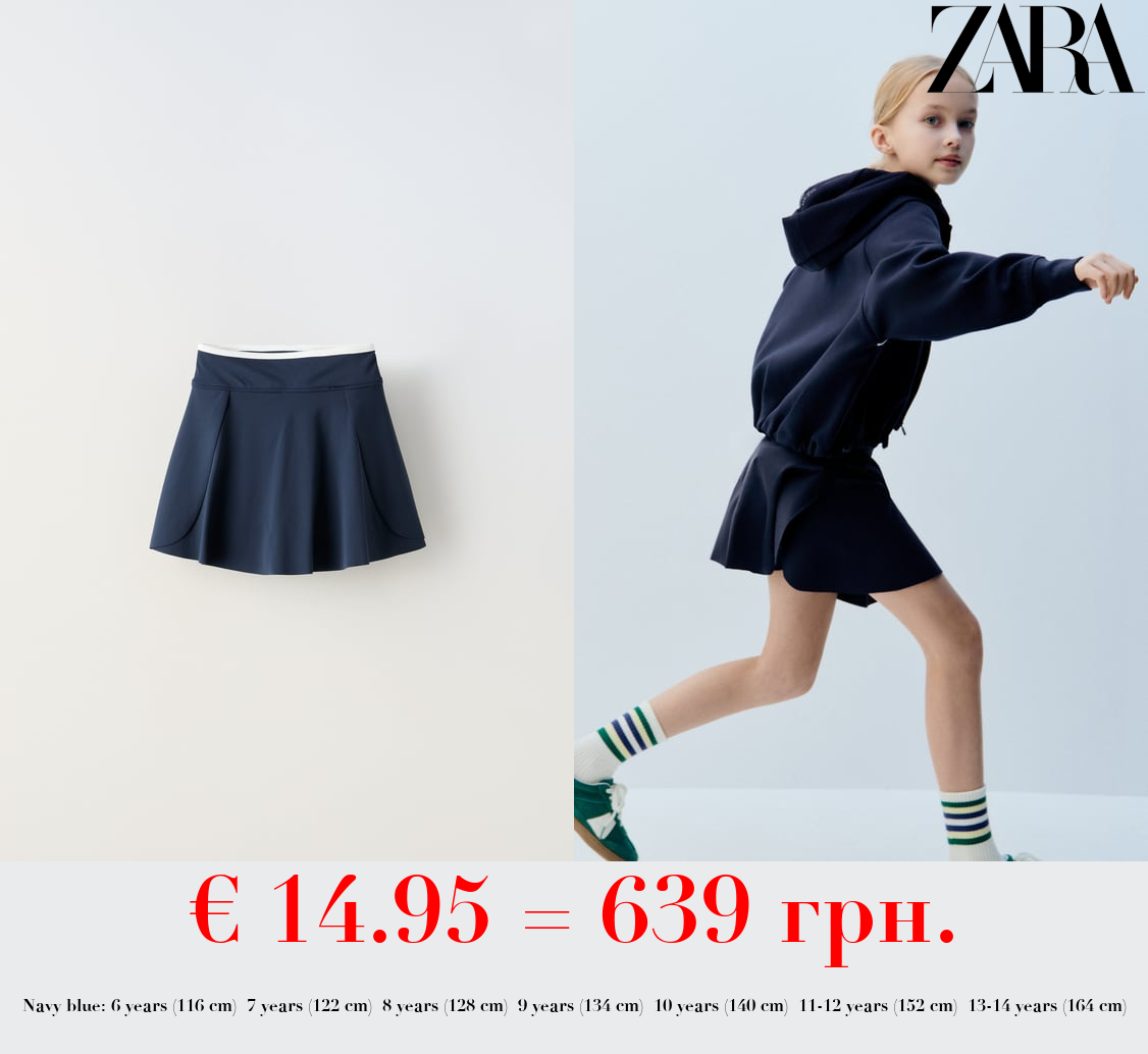 PLEATED BERMUDA SKORT