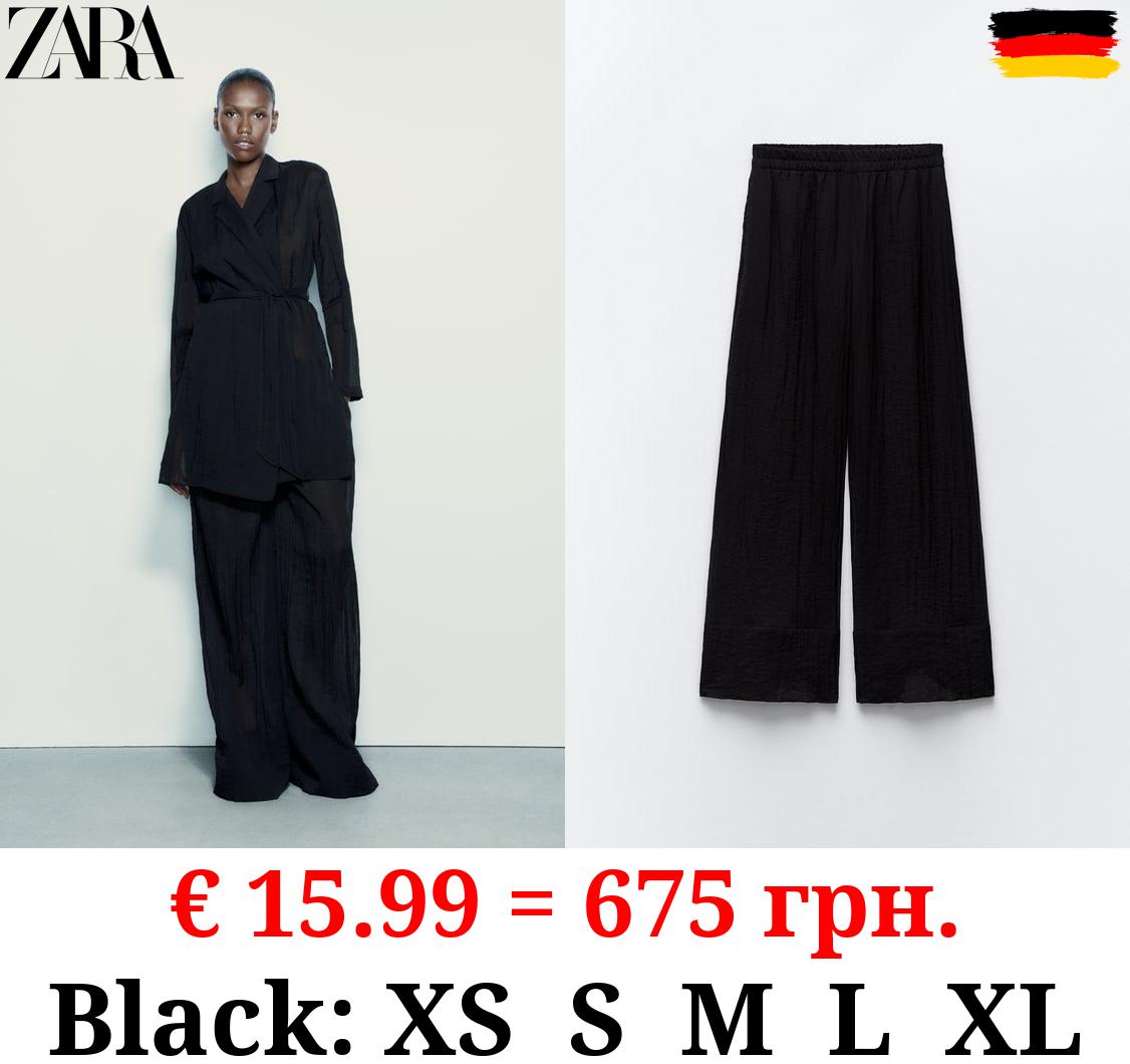 MINIMALIST PALAZZO TROUSERS