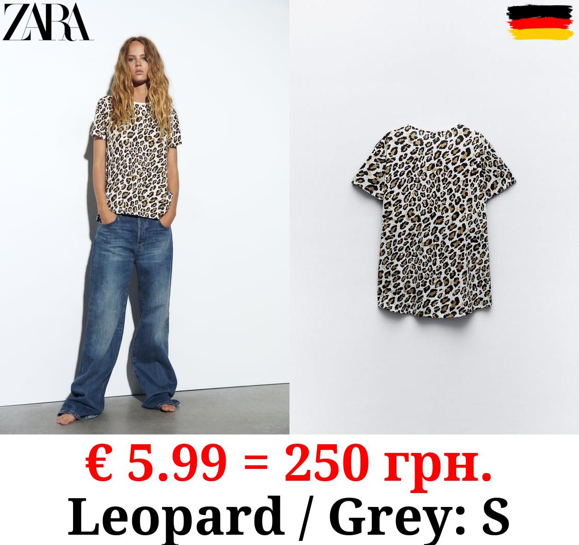 BASIC T-SHIRT WITH ASYMMETRIC HEM