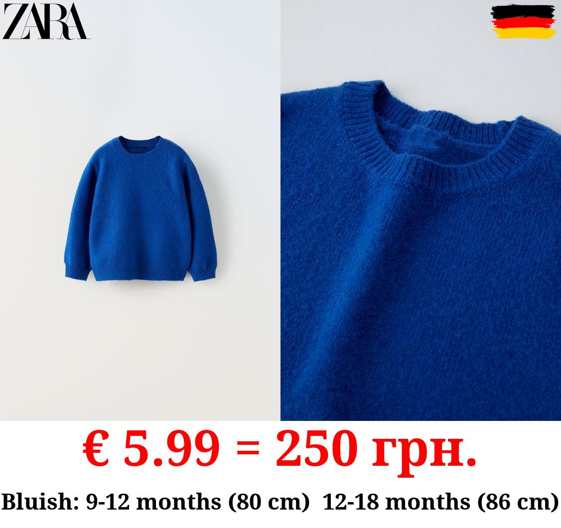 SOFT TOUCH KNIT SWEATER