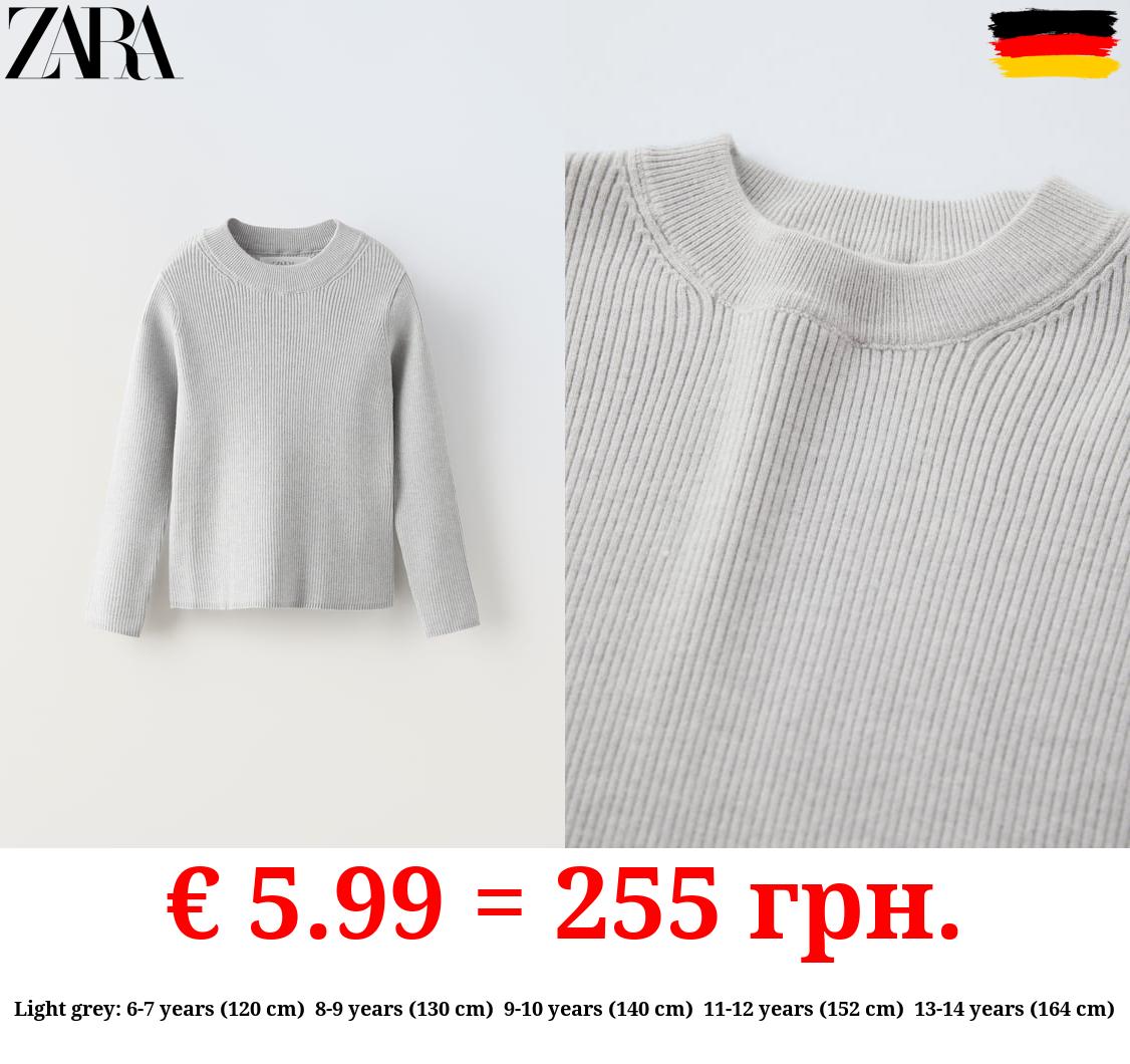 RIBBED KNIT SWEATER
