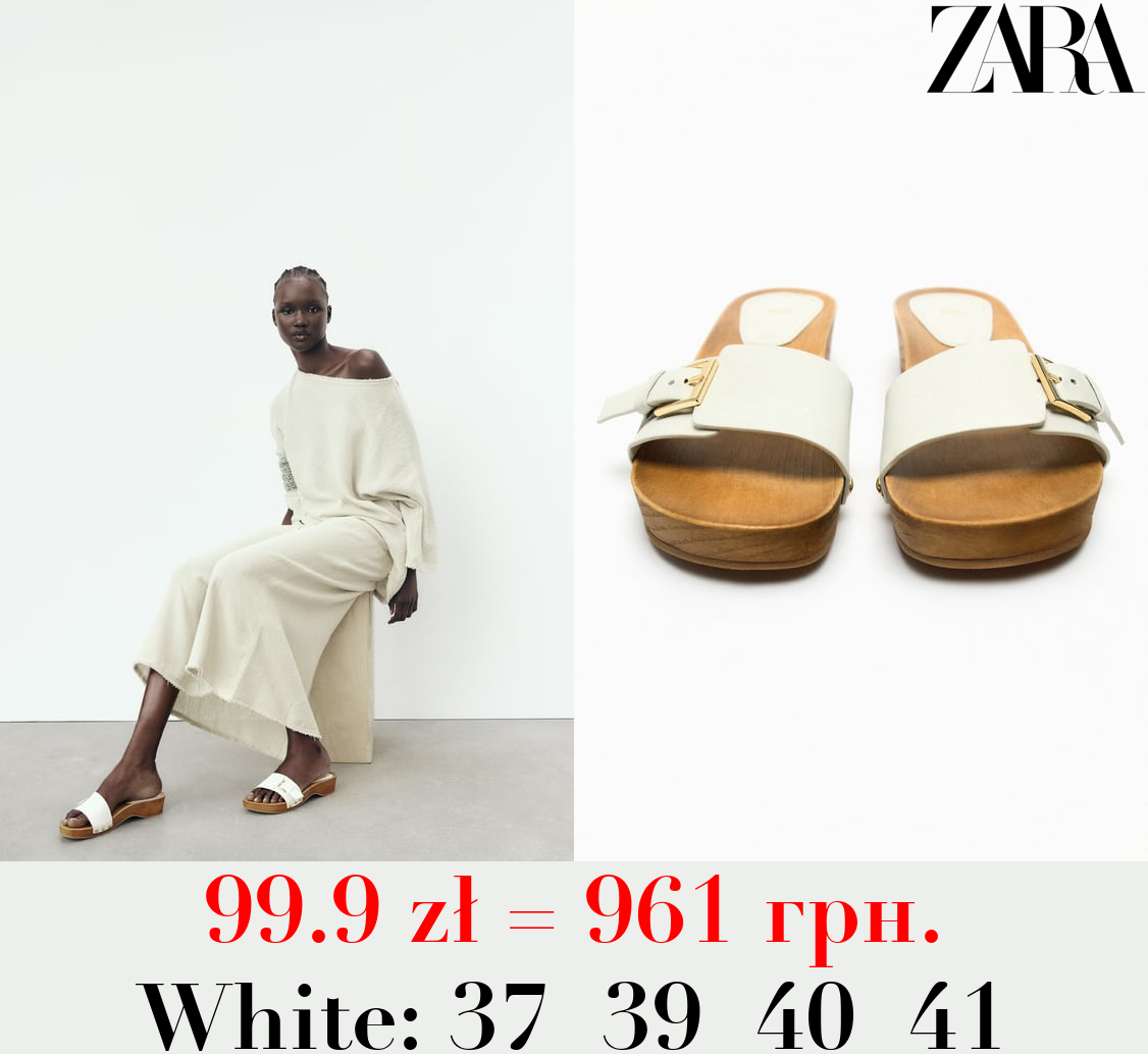 BUCKLED LEATHER SANDALS