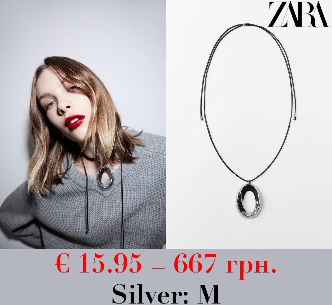 CORD NECKLACE WITH CIRCULAR PENDANT