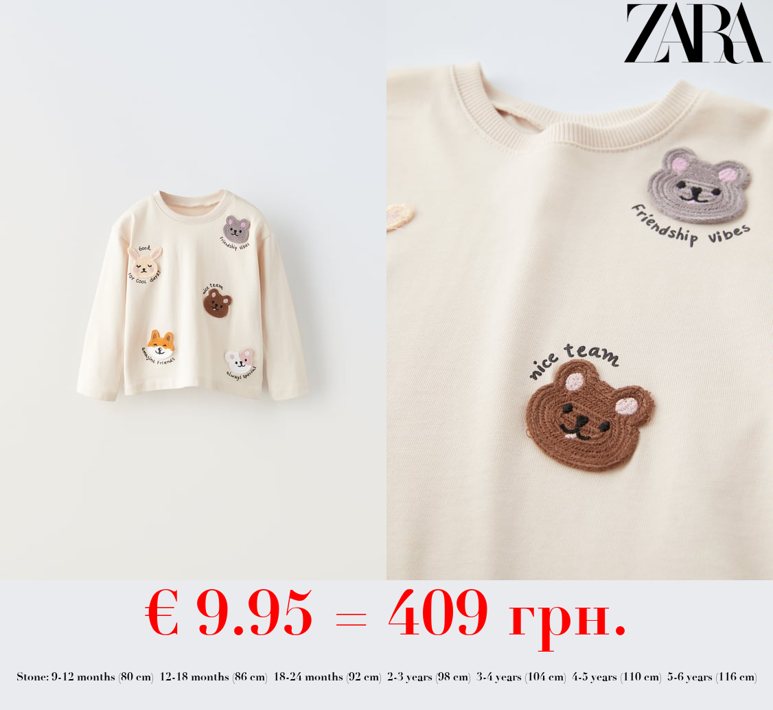 T-SHIRT WITH APPLIQUÉS