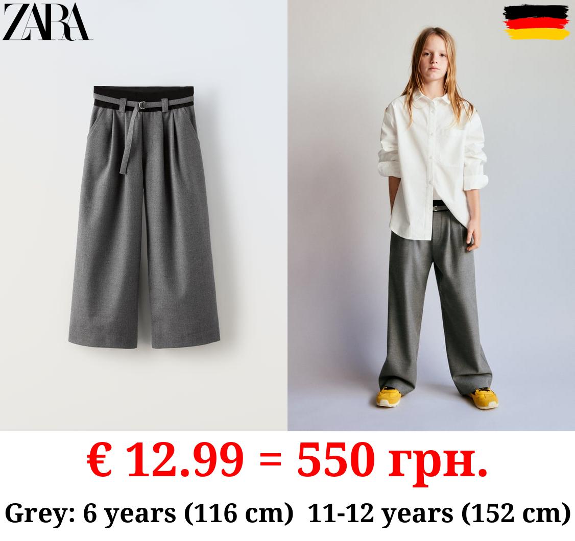 TROUSERS WITH DARTS AND ELASTIC DETAIL