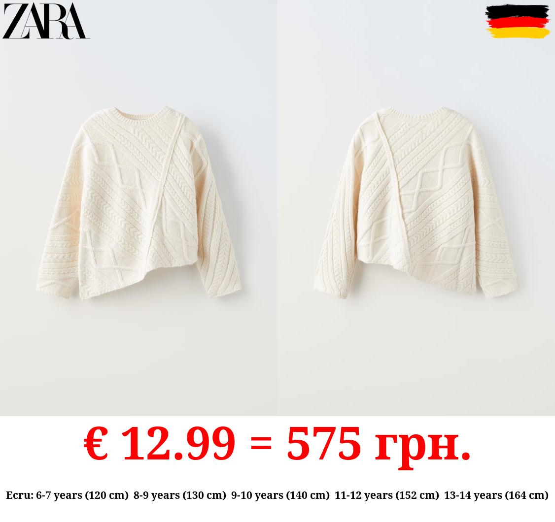 ASYMMETRIC KNIT SWEATER