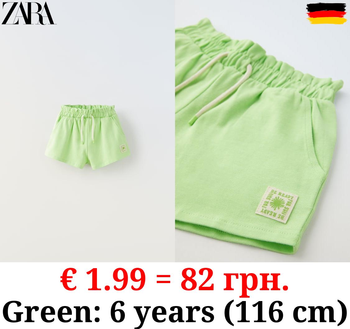 PLUSH BERMUDA SHORTS WITH LABEL DETAIL