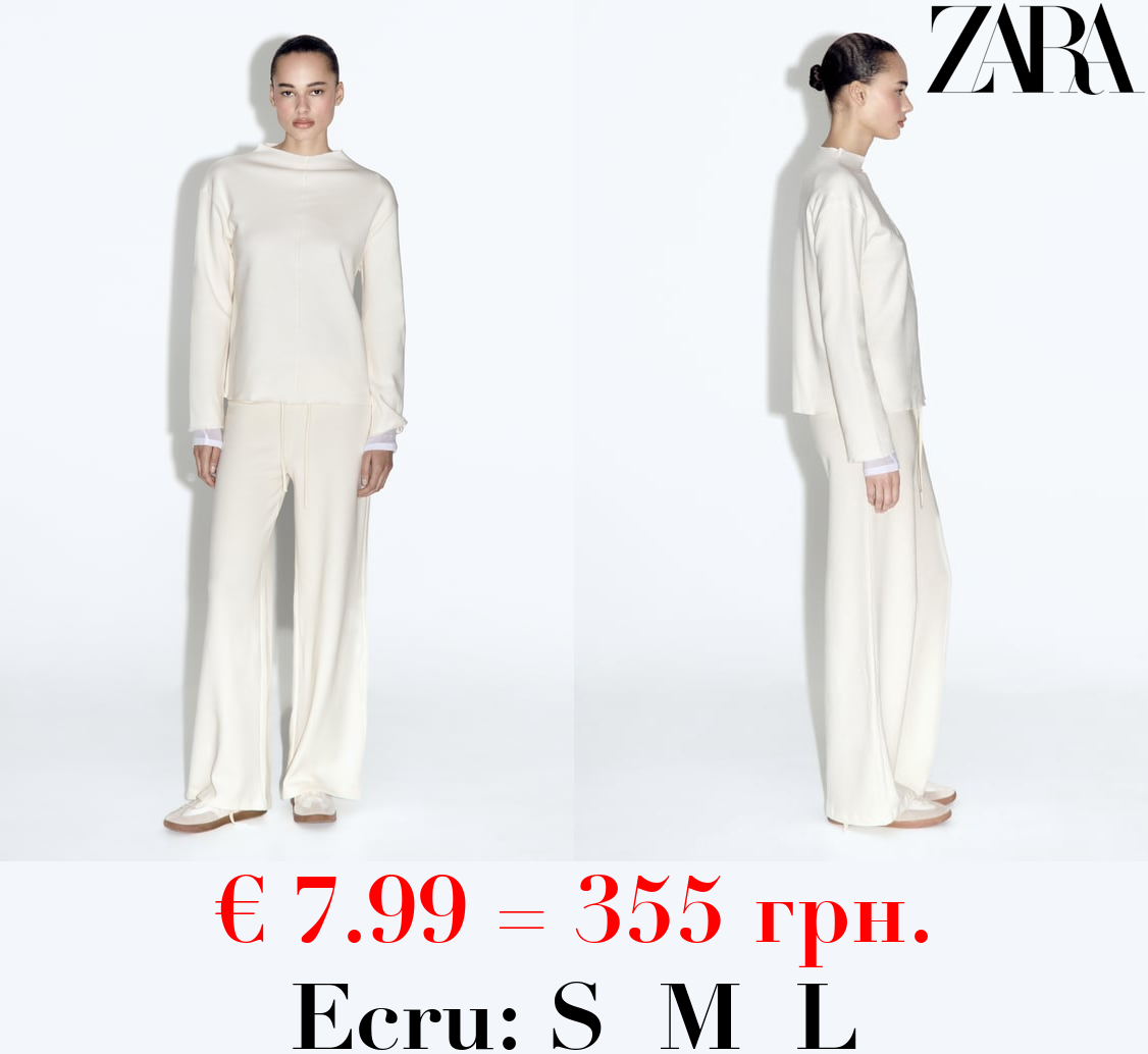 SOFT SWEATER WITH FRONT SEAM