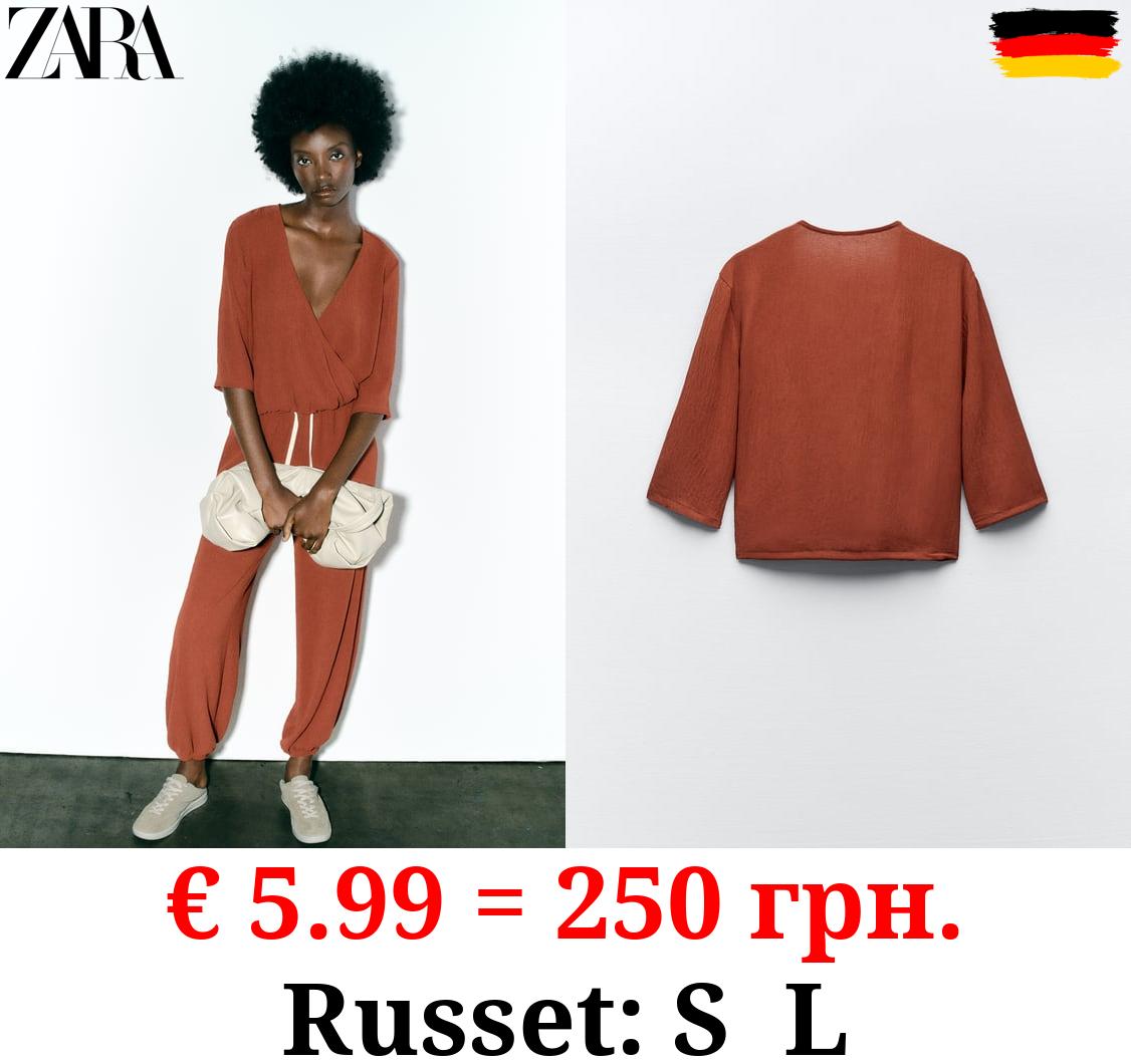 TEXTURED SURPLICE TOP