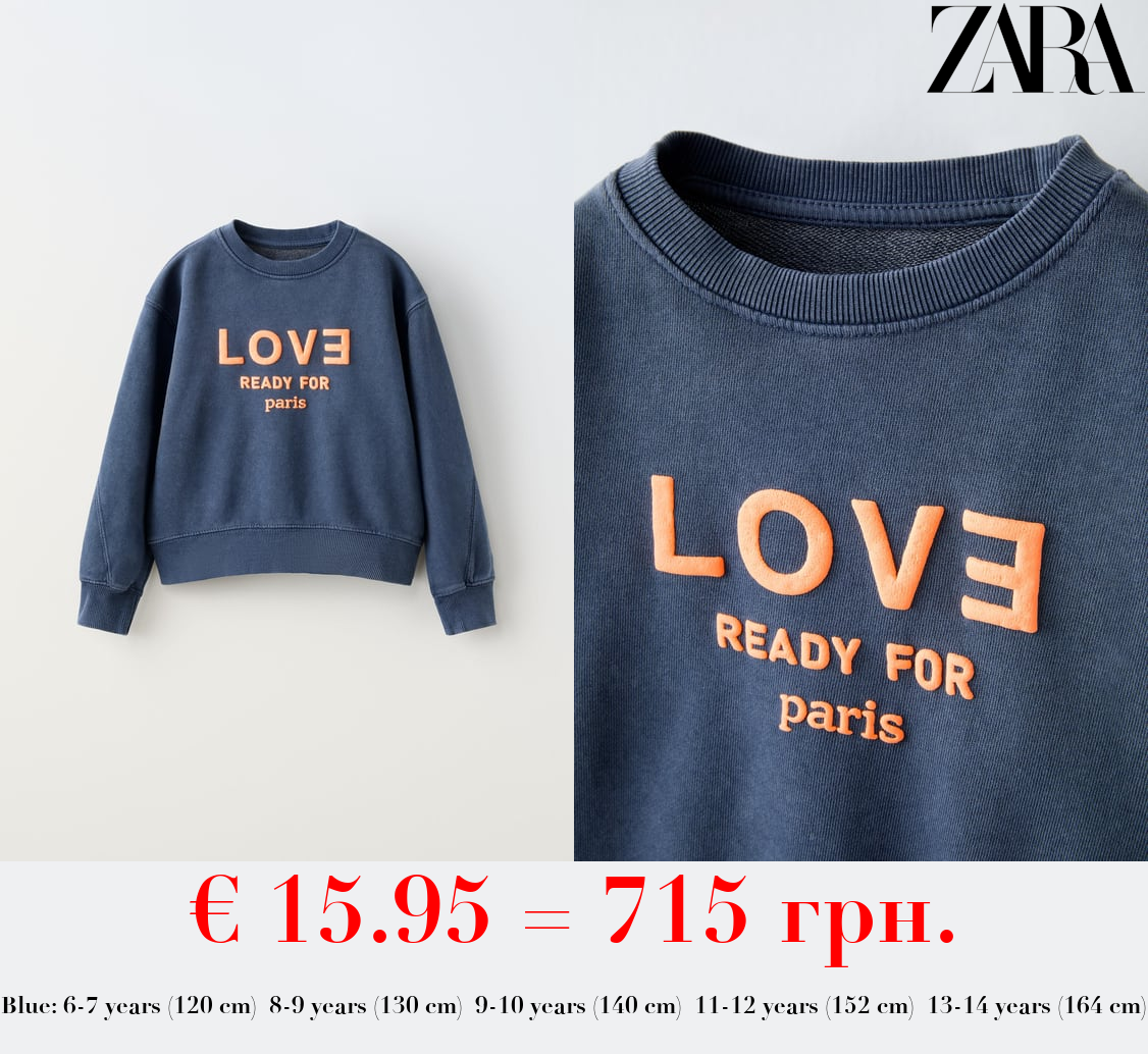 FADED SWEATSHIRT WITH SLOGAN