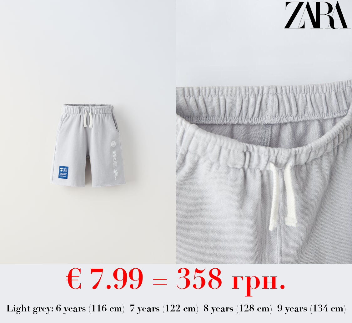 PRINTED BERMUDA SHORTS WITH LABEL