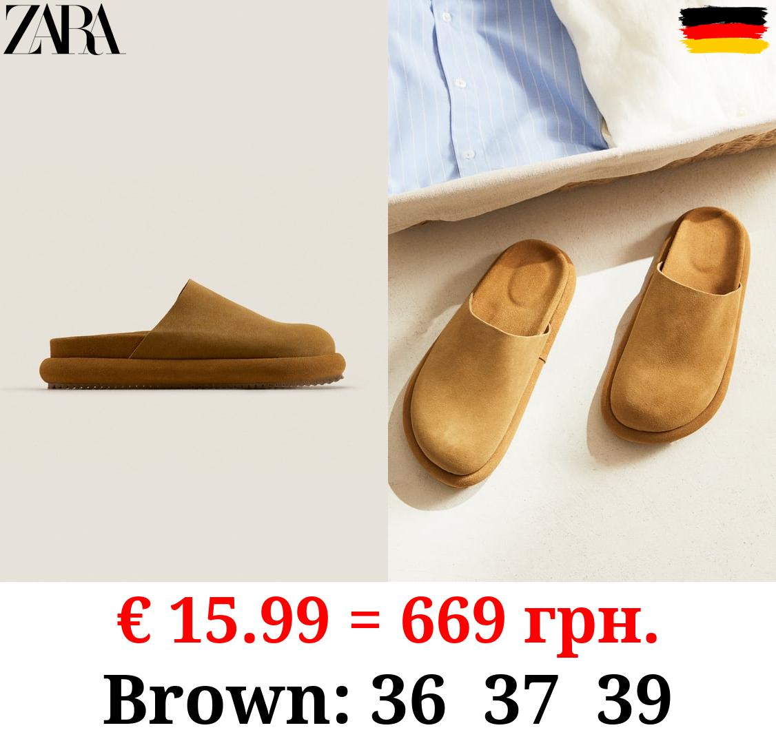 LEATHER MULE SLIPPERS WITH SOLE DETAIL